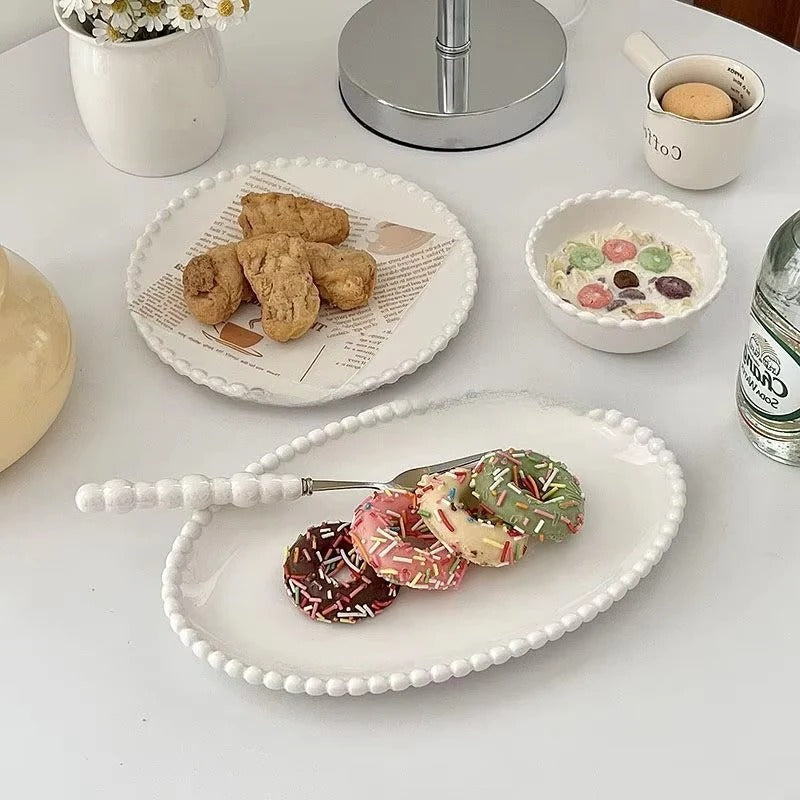Dinnerware Set with Beaded Rim and Ceramic Design