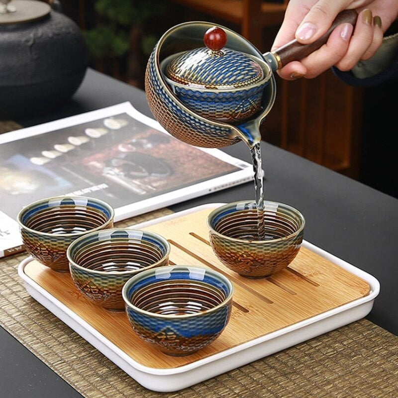 Tea Pot Set with Rotating Design and Infuser